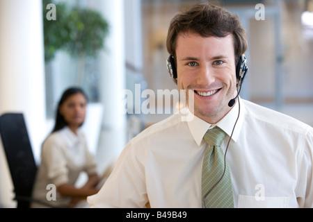 Businessman on his headset Stock Photo