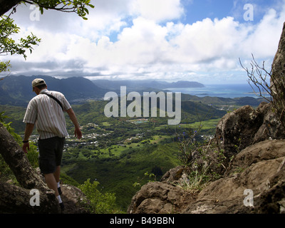 hiker on a trail, olomana ridge, oahu, hawaii Stock Photo