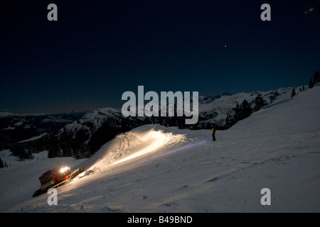 full moon night skiing Stock Photo