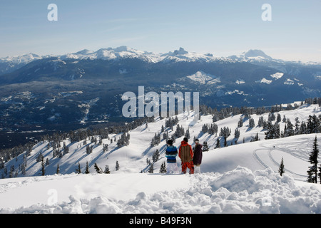 snowboarders with a scenic view of Whistler and Black Tusk Mountain Stock Photo
