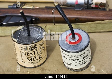 Trench Made Improvised Double Cylinder Jam Tin Grenade & Standard Issue Grenade Stock Photo