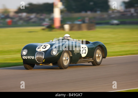 Sir Stirling Moss driving a Jaguar C Type at Goodwood Revival 2008 Stock Photo