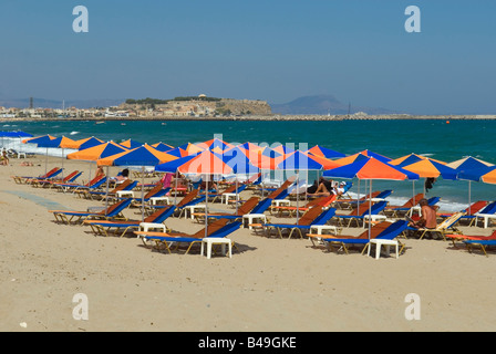 Sunbeds and Umbrellas on Rethymnon Beach Stock Photo