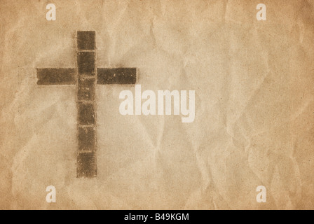 great image of a christian cross on parchment paper Stock Photo