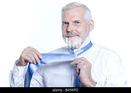 windsor necktie lesson doing by an handsome man Stock Photo