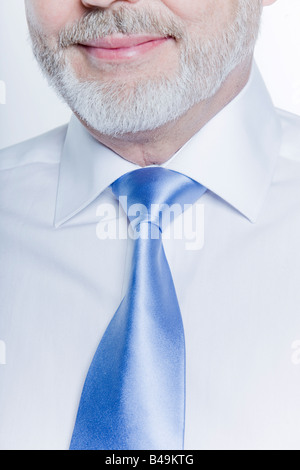windsor necktie lesson doing by an handsome man Stock Photo