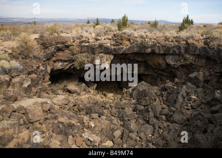 Upper entrance to the Sentinel lava tube cave, Lava Beds National Monument, California Stock Photo