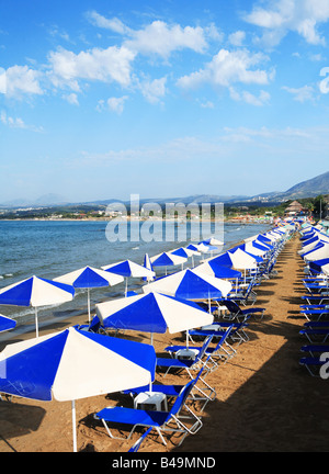 A view of sunbeds awaiting tourists at the Greek island resort of Georgioupolis on Crete s north coast Stock Photo