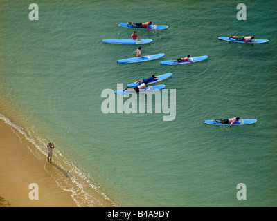 Paddling out to surf - Waikiki Beach from above. Stock Photo