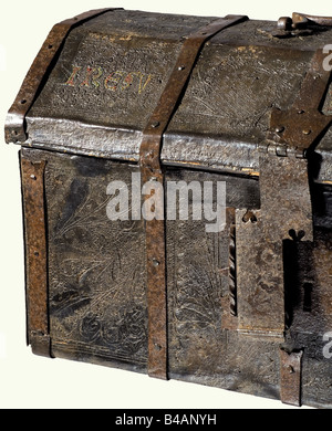 A late Gothic travelling chest, France, circa 1500. A small rectangular chest with an arched lid of leather covered wood with iron strap fittings. The lid has a folding handle, a frontal lock with hasp, key included. The leather cover has finely tooled Gothic ornamentation. The front of the lid bears the lightly coloured inscription "IRESU" and "MARIA". The interior linen lining has been renewed. Dimensions 29 x 50 x 28 cm. historic, historical, 16th century, handicrafts, handcraft, craft, object, objects, stills, clipping, clippings, cut out, cut-out, cut-outs, Stock Photo