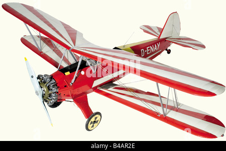 A fine flying scale model, of Focke-Wulf Fw.44 "Stieglitz"-D-ENAY, "Quax" Fully braced upper and lower mainplanes, flying control surfaces, excellent cockpit detail for pilot and pupil/passenger, the dummy seven-cylinder Siemens radial engine concealing a two-stroke petrol engine, with dummy propeller, the sprung main undercarriage with rubber tyres and steerable tail wheel, finished in red, yellow and white "barnstorming sunburst" display livery, (234 cm wing span). historic, historical, 1910s, 20th century, First World War / WWI, world war, world wars, milita, Stock Photo