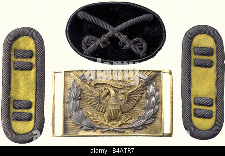 Insignia for a Northern Cavalry Captain, in the American Civil War (1861 - 1865). A pair of shoulder boards, yellow with silver embroidery and a cap badge of silver embroidery on black velvet. There is also a fire-gilded belt buckle with the American Eagle in a silver laurel wreath, complete with the opposite catch. historic, historical, 19th century, USA, United States of America, American, object, objects, stills, clipping, clippings, cut out, cut-out, cut-outs, uniform, uniforms, Stock Photo