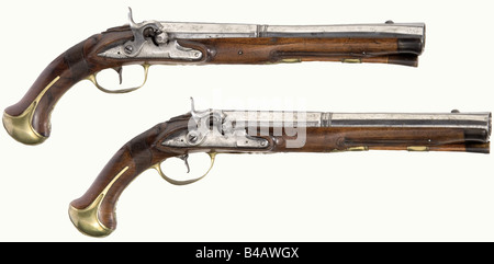 A pair of percussion blunderbuss pistols, Joseph Stöckl in Neustadt/Vienna, circa 1760. Two-stage barrels, the breech section octagonal then round with wide, horizontally oval belled muzzles. On top of the barrels engraved signatures next to rocaille ornamentation. Converted locks. Lightly carved walnut full stocks with horn nose caps and smooth brass furniture. Wooden ramrods with horn tips. Length of each 44 cm. historic, historical, 18th century, civil handgun, civil handguns, handheld, gun, guns, firearm, fire arm, firearms, fire arms, weapons, arms, weapon, Stock Photo