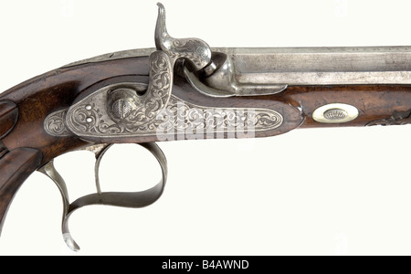 A cased pair of target pistols, Hermite à Saumur, circa 1840. Octagonal barrels with patent breeches, ten groove rifled bores in 12 mm calibre. Maker's signature engraved on top of the barrels. Locks are decorated with fine arabesque engraving. Beautifully figured, carved walnut half stocks. Engraved iron furniture. Length of each 43 cm. In a matching lockable case, lined with green velvet. Comprehensive and complete set of accessories with powder flask, nipple wrench, screwdriver, bullet mold, loading hammer, and cleaning rod. Dimensions 50 x 30 x 7 cm. histor, Stock Photo