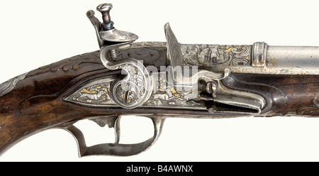 A flintlock hunting pistol, German, circa 1760. Round, three-stage barrel with a smooth bore in 12 mm calibre. There is a engraved picture of a stag amid decorative rocaille on top of the chamber. Richly chiselled lock. Lightly carved walnut stock with horn nose cap. The entire surface of all the iron furniture is cut with depictions of numerous wild animals amid decorative rocaille, the background showing remnants of gilding. Wooden ramrod with horn tip. Length 36 cm. historic, historical, 18th century, civil handgun, civil handguns, handheld, gun, guns, firea, Stock Photo