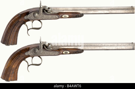 A cased pair of target pistols, Hermite à Saumur, circa 1840. Octagonal barrels with patent breeches, ten groove rifled bores in 12 mm calibre. Maker's signature engraved on top of the barrels. Locks are decorated with fine arabesque engraving. Beautifully figured, carved walnut half stocks. Engraved iron furniture. Length of each 43 cm. In a matching lockable case, lined with green velvet. Comprehensive and complete set of accessories with powder flask, nipple wrench, screwdriver, bullet mold, loading hammer, and cleaning rod. Dimensions 50 x 30 x 7 cm. histor, Stock Photo