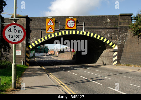 A low railway bridge in Market Harborough Leicestershire carrying Leicester to London Main Line trains (Midlands Main line) Stock Photo