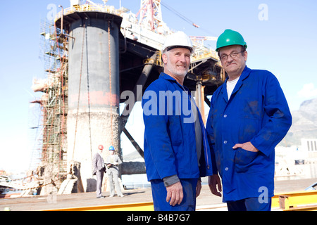 Two construction engineers standing together Stock Photo