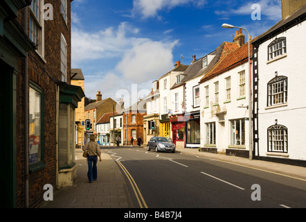 Typical small English town street scene. A pedestrianised street with ...