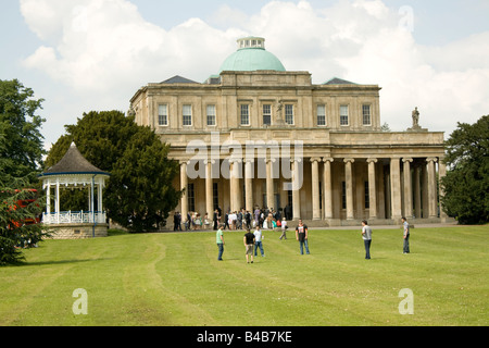 People enjoying game outside Pittville Pump Rooms Cheltenham UK Stock Photo