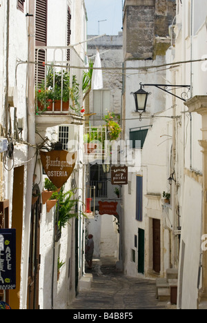 Narrow streets of The white city of Ostuni Puglia Italy Stock Photo