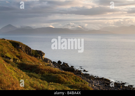 Evening light over Raasay and the Cuillin Hills viewed from Applecross Stock Photo