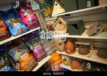 Bird seed, nuts and boxes on sale in the shop at the RSPB's bird and wildlife reserve at Rainham Marshes, Essex Stock Photo
