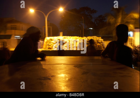 Maldivian crewmen arrive home late after a day's yellowfin tuna fishing aboard a dhoni fishing boat in the Indian Ocean Stock Photo