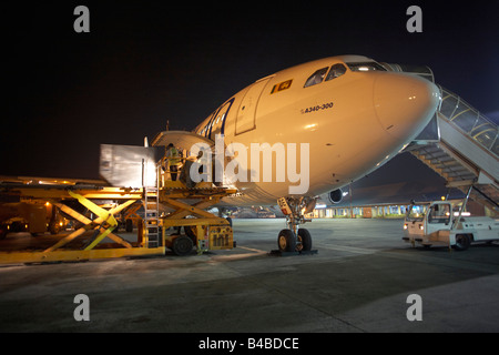 One the apron of Male International Airport Maldives a Sri Lankan Airlines A340 300 series Airbus prepares for departure Stock Photo