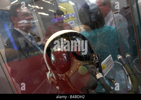 A high-tech fighter pilot's helmet by French company Ulmer Aeronautics is displayed near delegates at the Paris Air Show. Stock Photo