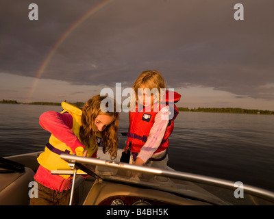 Two girls on a boat Stock Photo