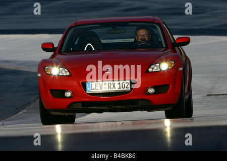 Car, Mazda RX 8, roadster, model year 2002-, red, coupe/Coupe, FGHDS, driving, diagonal from the front, frontal view, Test track Stock Photo