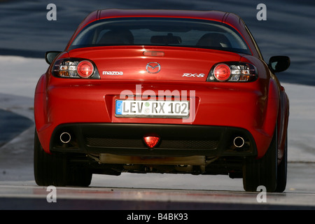 Car, Mazda RX 8, roadster, model year 2002-, red, coupe/Coupe, FGHDS, driving, rear view, Test track Stock Photo