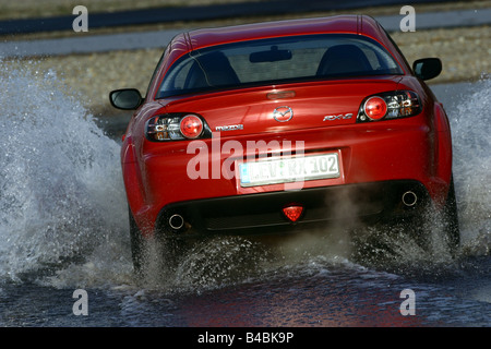 Car, Mazda RX 8, roadster, model year 2002-, red, coupe/Coupe, FGHDS, driving, rear view, test track, Water, Aquaplaning Stock Photo