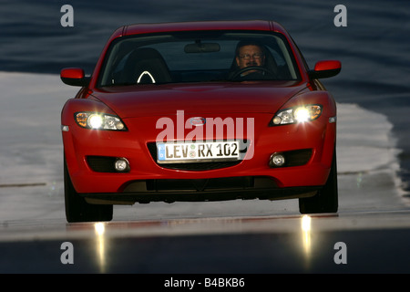 Car, Mazda RX 8, roadster, model year 2002-, red, coupe/Coupe, FGHDS, driving, frontal view, Test track Stock Photo