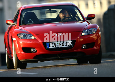 Car, Mazda RX 8, roadster, model year 2002-, red, coupe/Coupe, FGHDS, driving, diagonal from the front, frontal view, City Stock Photo