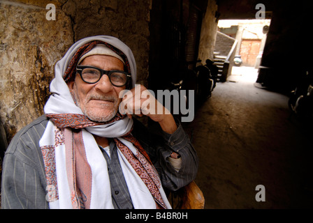 Old man sitting in the streets of Cairo Egypt Stock Photo