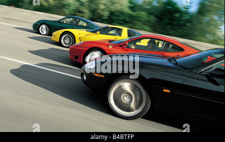 Car, group picture, roadster, coupe, Jaguar XKR, model year 2000-, black, Ferrari 360 Modena F1, Year of construction 1999-, red Stock Photo
