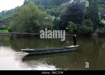 Old hand pulled rope ferry acress the Wye river Symonds Yat Herefordshire England Stock Photo