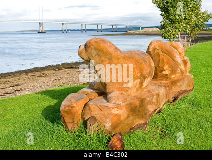 Wooden Chainsaw Sculpture of Common Seal at Merkinch Inverness. Stock Photo