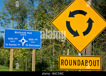 Roundabout traffic lane control signs Stock Photo