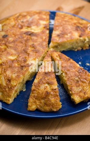 Freshly home made Spanish potato tortilla left to cool on a balcony in Valencia Spain Stock Photo