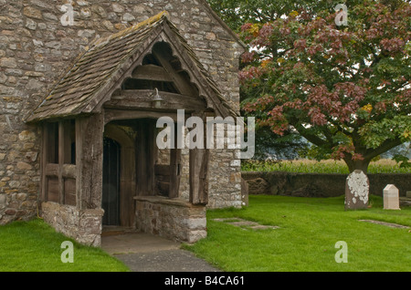 Wooden church porch at the church of All Saints at Kemeys Commander in Monmouthshire Stock Photo