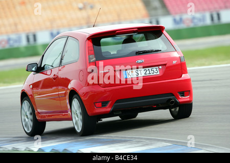 Car, Ford Fiesta ST, small approx., red, model year 2005-, driving, diagonal from the back, rear view, test track, photographer: Stock Photo