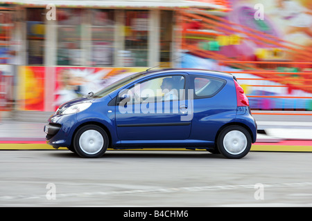 Peugeot 107, model year 2005-, blue moving, side view, City Stock Photo