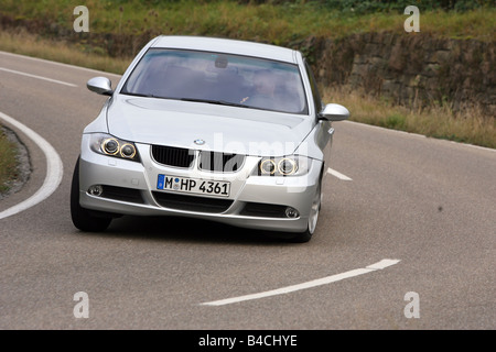 BMW 318i, model year 2004-, silver, driving, diagonal from the front, frontal view, country road Stock Photo