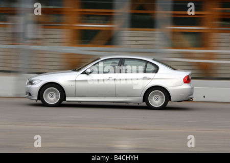 BMW 318i, model year 2004-, silver, driving, side view, City Stock Photo