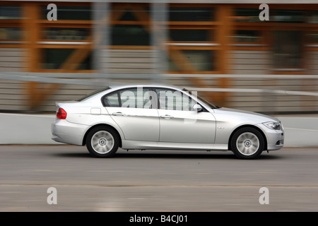 BMW 318i, model year 2004-, silver, driving, side view, City Stock Photo