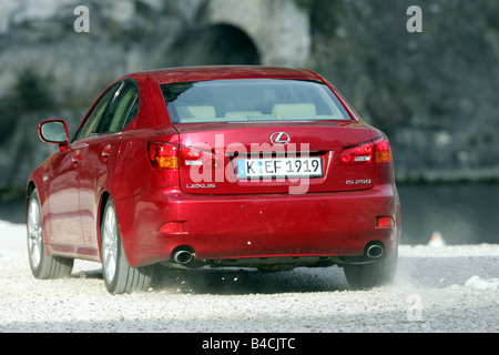 Lexus IS 250, model year 2005-, red, driving, diagonal from the back, Rear view Stock Photo