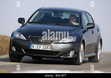 Lexus IS 250, model year 2005-, black, driving, diagonal from the front, frontal view, country road Stock Photo